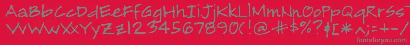 Alamendro-Schriftart – Graue Schriften auf rotem Hintergrund