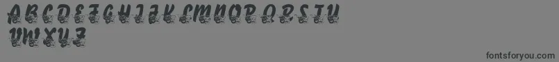 LmsComedyOfTragedies-Schriftart – Schwarze Schriften auf grauem Hintergrund