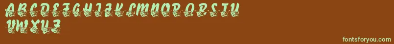 フォントLmsComedyOfTragedies – 緑色の文字が茶色の背景にあります。