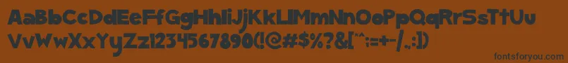 ScGumKids Font – Black Fonts on Brown Background