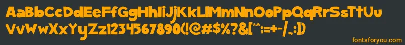 ScGumKids Font – Orange Fonts on Black Background