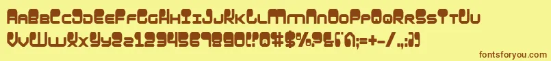 フォントHypnoAgentCondensed – 茶色の文字が黄色の背景にあります。