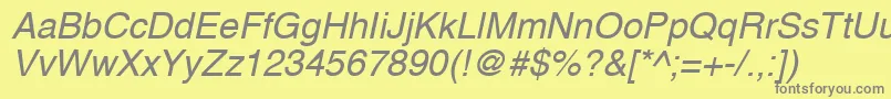 fuente A1010helvetikaNItalic – Fuentes Grises Sobre Fondo Amarillo