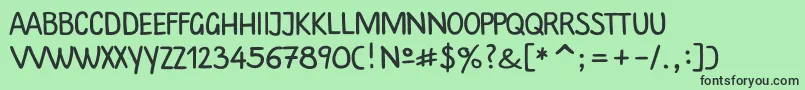 Plainscriptc-fontti – mustat fontit vihreällä taustalla
