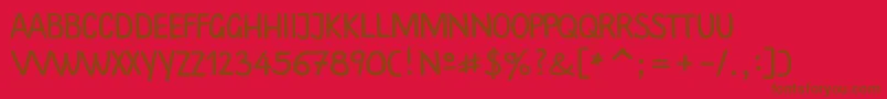 Plainscriptc-Schriftart – Braune Schriften auf rotem Hintergrund