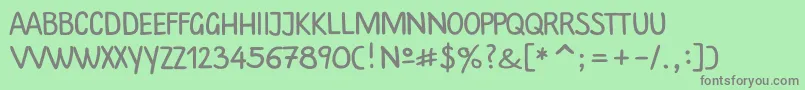 フォントPlainscriptc – 緑の背景に灰色の文字