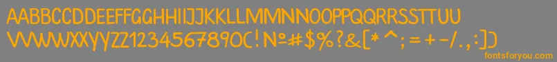 フォントPlainscriptc – オレンジの文字は灰色の背景にあります。