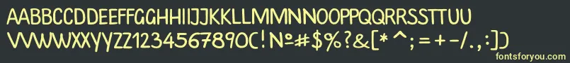 フォントPlainscriptc – 黒い背景に黄色の文字