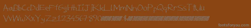 Deliciousfrosting Font – Gray Fonts on Brown Background