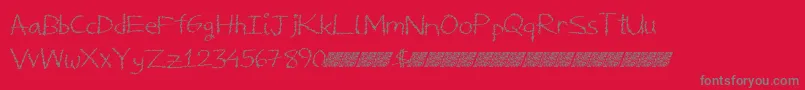 Czcionka Deliciousfrosting – szare czcionki na czerwonym tle