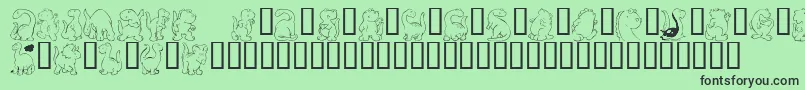 フォントKr Nickys Dinos – 緑の背景に黒い文字