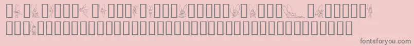 SlWoodcutFaeries-fontti – harmaat kirjasimet vaaleanpunaisella taustalla
