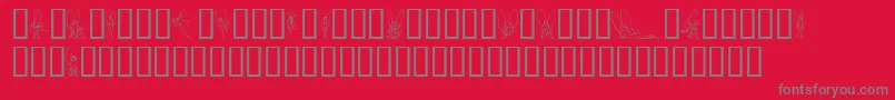 SlWoodcutFaeries-fontti – harmaat kirjasimet punaisella taustalla