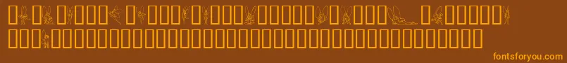 SlWoodcutFaeries Font – Orange Fonts on Brown Background