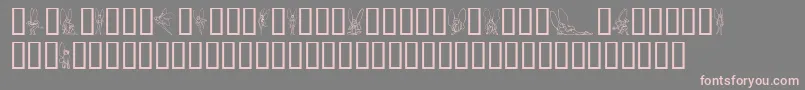 フォントSlWoodcutFaeries – 灰色の背景にピンクのフォント
