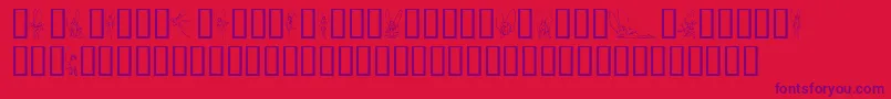 フォントSlWoodcutFaeries – 赤い背景に紫のフォント