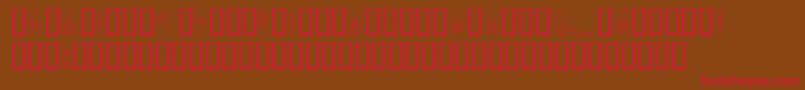 フォントSlWoodcutFaeries – 赤い文字が茶色の背景にあります。