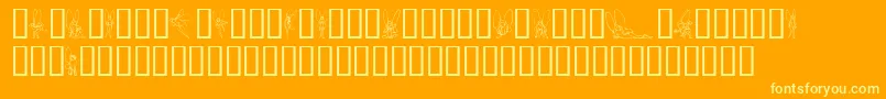 SlWoodcutFaeries-fontti – keltaiset fontit oranssilla taustalla