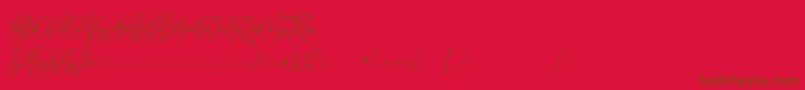 Otella Font – Brown Fonts on Red Background