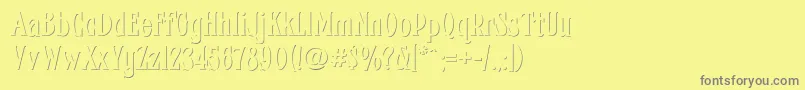 フォントFhacondfrenchshadenc – 黄色の背景に灰色の文字