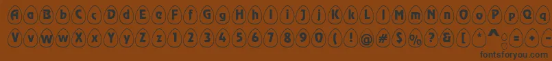 EggswhiteBecker Font – Black Fonts on Brown Background