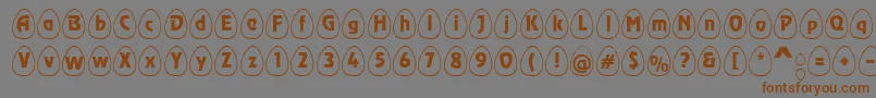 EggswhiteBecker Font – Brown Fonts on Gray Background