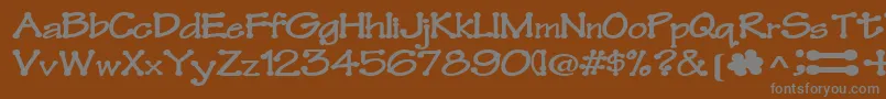 Шрифт Feltpointnew35RegularTtext – серые шрифты на коричневом фоне