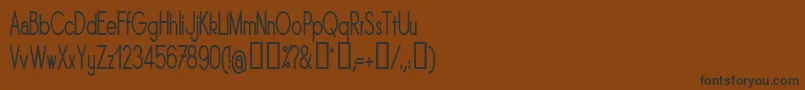 Sornrgc Font – Black Fonts on Brown Background