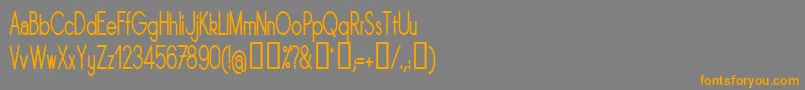 フォントSornrgc – オレンジの文字は灰色の背景にあります。