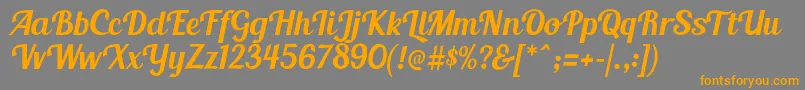 BlendaScript Font – Orange Fonts on Gray Background