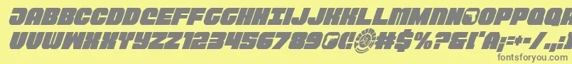 フォントTaurocondital11 – 黄色の背景に灰色の文字