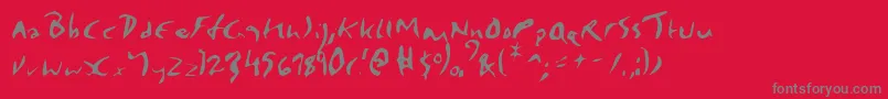Elmore-fontti – harmaat kirjasimet punaisella taustalla