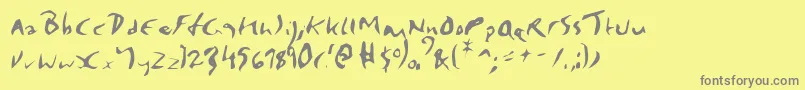 Elmore-fontti – harmaat kirjasimet keltaisella taustalla