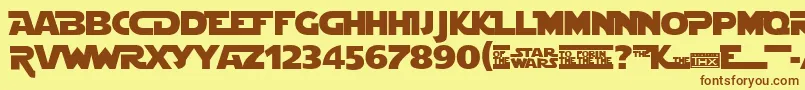 フォントStjedise – 茶色の文字が黄色の背景にあります。