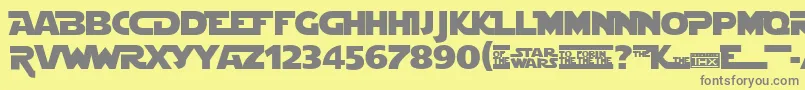 フォントStjedise – 黄色の背景に灰色の文字