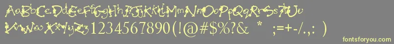 AlienMutationsBegin Font – Yellow Fonts on Gray Background