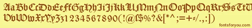 Dscaslongotisch Font – Brown Fonts on Yellow Background