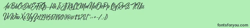 NovithaScriptDemo Font – Black Fonts on Green Background