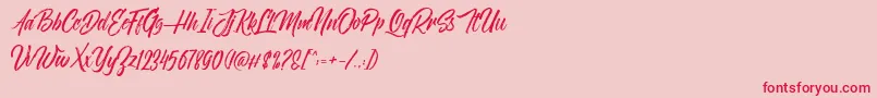 NovithaScriptDemo Font – Red Fonts on Pink Background
