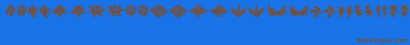 Czcionka SchlussVignetten – brązowe czcionki na niebieskim tle