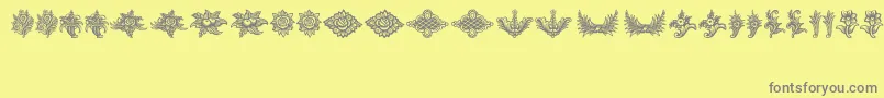 SchlussVignetten-fontti – harmaat kirjasimet keltaisella taustalla