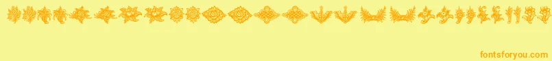 Czcionka SchlussVignetten – pomarańczowe czcionki na żółtym tle