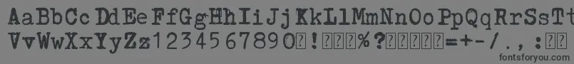 Lucznik1303-Schriftart – Schwarze Schriften auf grauem Hintergrund