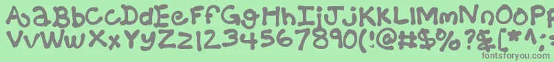 フォントKbballoonanimal – 緑の背景に灰色の文字