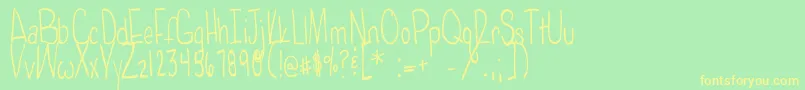 Poisonedapples Font – Yellow Fonts on Green Background