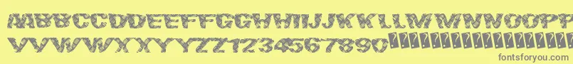 フォントFinalslash – 黄色の背景に灰色の文字