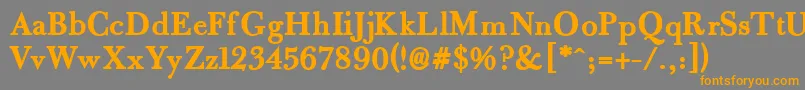 フォントFradleB – オレンジの文字は灰色の背景にあります。