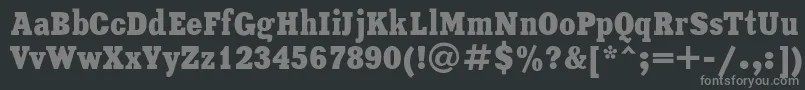 Xeniacondensed-fontti – harmaat kirjasimet mustalla taustalla