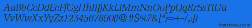 D790RomanItalic Font – Black Fonts on Blue Background