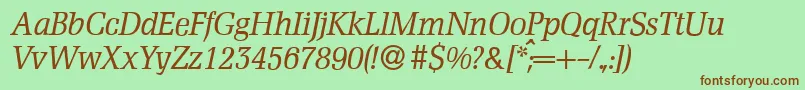D790RomanItalic-fontti – ruskeat fontit vihreällä taustalla
